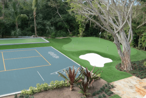 backyard putting green featuring a game court