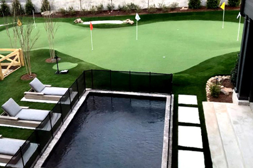 Short Game Green next to Swimming Pool